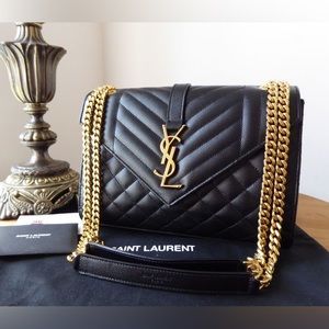 Saint Laurent black and gold flap used once, excellent condition